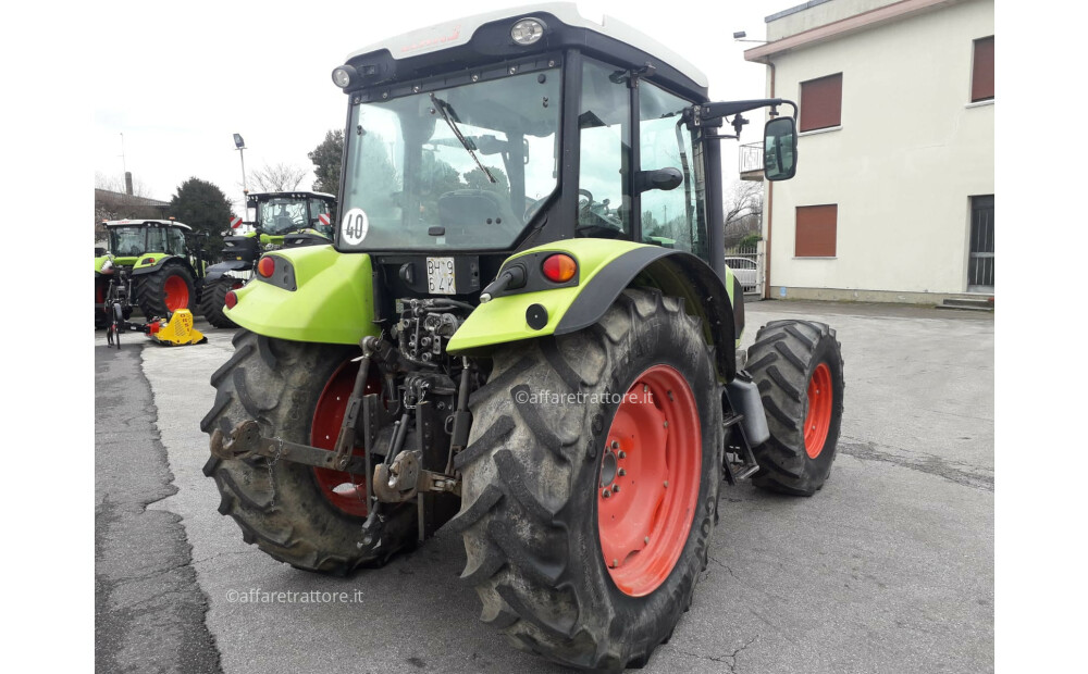 Traktor CLAAS AXOS 330 - 4